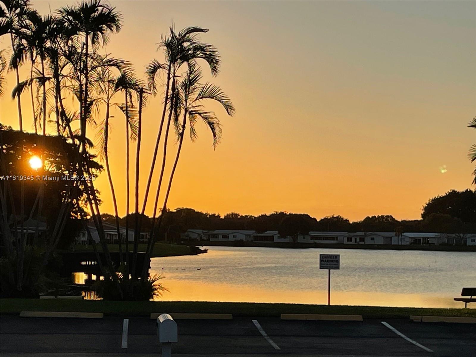 HUGE REDUCTION.....RELAX AND WATCH THE BEAUTIFUL SUN SETTING ON THE LAKE FROM YOUR PATIO. GREAT LOCATION ACROSS FROM THE MAIN CLUBHOUSE. ADMIRAL MODEL DOUBLE DRIVEWAY. FRESHLY PAINTED, REMODELED KITCHEN & BATHROOMS. NEW FLOORING. HI-HATS & NO POPCORN CEILINGS. SEPARATE PANTRY & BREAKFAST AREA IN KITCHEN. LIVING RM, DINING RM, FAMILY RM. MASTER BEDROOM, OVERSIZED WALK-IN CLOSET & SECOND SMALL WALK-IN CLOSET. GUEST BEDROOM HAS DOUBLE CLOSET. COMMUNITY POOL, SHOWERS, SAUNA, HOT TUB, CARD ROOMS, BILLIARDS, LIBRARY, WORKSHOP, HOBBY ROOM, & PING PONG. SHOWS PARTIES & SOCIAL CLUBS. SATELITE CLUBHOUSE, STATE-OF-THE-ART EXERCISE ROOM, TENNIS, POOL & HOT TUB. EASY ACCESS TO DADE & PALM BEACH. 3O MINUTES TO BEACHES & AIRPORTS. NEAR SAWGRASS MALL. GROCERY, BANKS, HOSPITAL & RESTAURANTS. COURTESY BUS