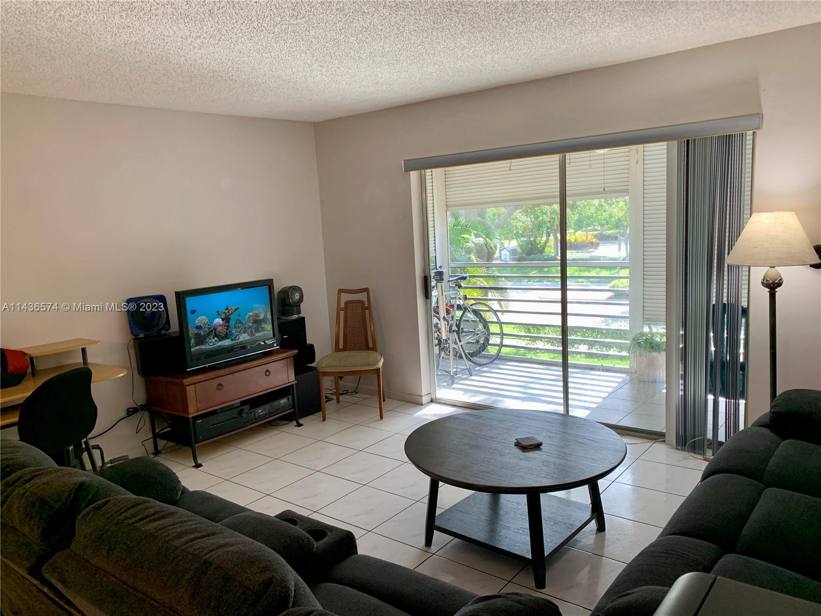 Must see move in ready unit in Highly desired 55+ Fairways Of Tamarac community. Spacious 2 bedroom 2 bath located on the second floor. Washer and dryer inside unit. Walk-in closet in both bedrooms. Screen balcony. Peaceful quiet community. Community clubhouse, pool, tennis courts located right across the street. Additional storage space in building storage room. EASY TO SHOW