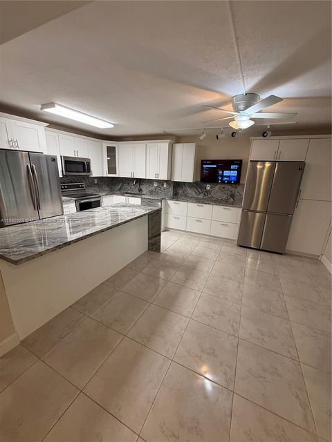 Photo of 20381 NE 30th Ave #118-7, Aventura, FL 33180 (MLS # A11882283)