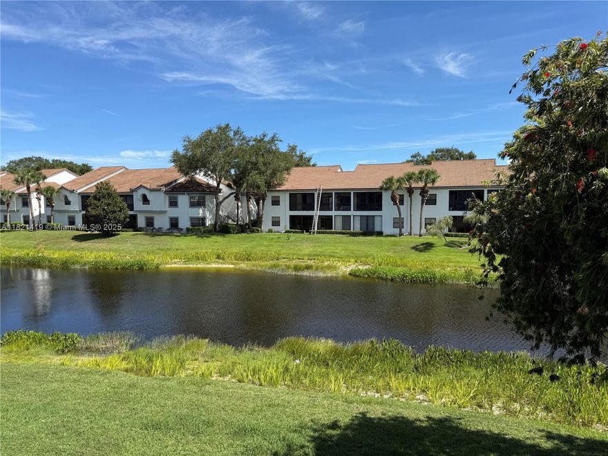 Awesome 3 bedroom, 2 bath waterfront condo with remodeled kitchen, new stainless steel appliances and washer/dryer. Granite counter tops in the kitchen. Two double sliding glass doors open to fully screened balcony to enjoy the water views. NO Carpet. 2nd floor corner unit. Lots of natural light. Lake views from every room. High volume ceilings. Resort style club house with a gorgeous pool, gym, library, cafe, tennis courts and much more. Man-gated community. You will love living here!!!