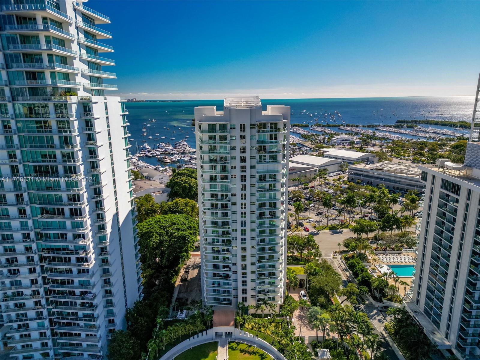 Enjoy the lifestyle of living in one of the residences at the Grove Hill a sought out boutique building in Coconut Grove you will see a view from every window and a wrap around balcony. Every room has access to private balcony. The corner unit residence offers plenty of space, great for entertaining. The building offers great amenities with 24 hour security, valet service, tennis and pickle ball courts, pool, playground, gym, sauna. Take a walk to restaurants, waterfront marinas, shops and grocery store. The residence comes with 2 parkings and storage.