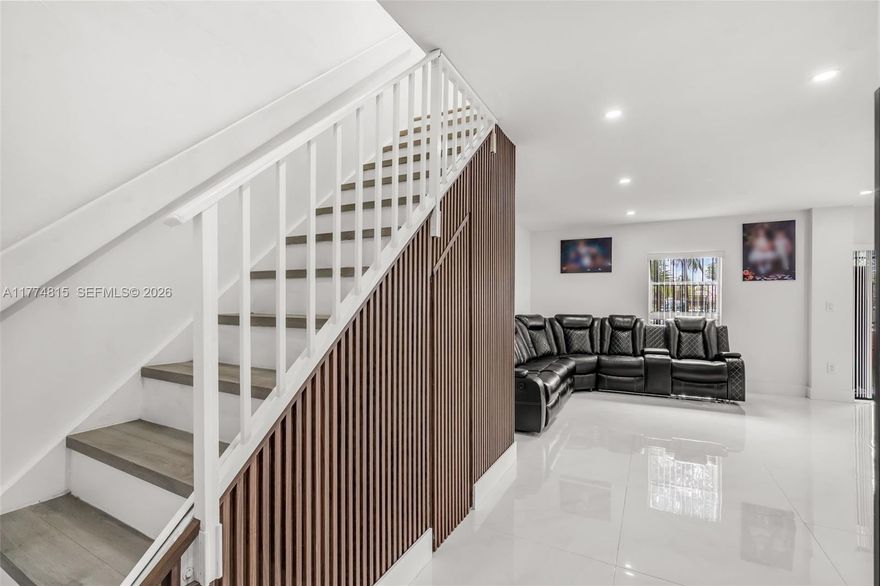 This 3-bedroom, 3-bathroom townhouse is beautifully remodeled with a modern kitchen featuring white wood cabinets and sleek countertops. The first floor includes a spacious living/dining area with ceramic flooring, a full bathroom, and a washer and dryer conveniently located downstairs. Enjoy a private terrace with pool access. Upstairs, find new vinyl flooring, three bedrooms, and two bathrooms. Extra storage under the stairs adds convenience ensuring a clutter-free and organized living space.  This beautiful home won’t last long—schedule your private tour today and make it yours!