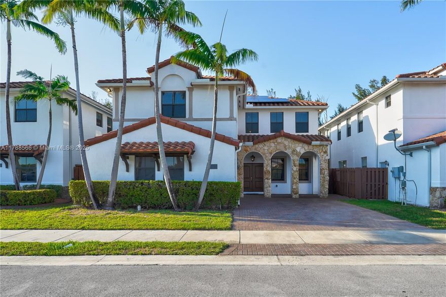 Beautifully maintained 4-bedroom, 3/1-bath two-story home in the exclusive Las Ramblas community. Features include solar panels, porcelain tile flooring downstairs, and dark wood flooring upstairs. The open layout offers a spacious living room and a gourmet kitchen with a breakfast area. The second floor includes an oversized master suite with a private balcony with a water view, walk-in closet, and luxurious en-suite bath, plus a small suite and two additional bedrooms with a shared Jack and Jill bathroom. Enjoy a private backyard retreat with a pool, jacuzzi, pergola, and stunning water views. Community amenities include 24/7 security, clubhouse, gym, business center, tennis courts, and playground. Conveniently located near Dolphin Mall, Miami International Airport, and major highways.