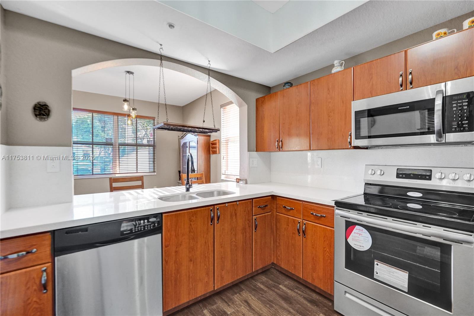Charming bottom-floor 3-bedroom, 2-bathroom condo located in an all-ages community. Featuring tile flooring throughout and essential appliances, this home also offers the added convenience of in-unit laundry. Nestled in a sought-after neighborhood, residents enjoy fantastic amenities, including a beautiful swimming pool, a stylish clubhouse, and a well-equipped gym. With two assigned parking spaces and easy access to major highways, this location offers unmatched accessibility. Just minutes from Dolphin Mall, International Mall, and an array of dining and shopping options, it is also near top-rated schools.