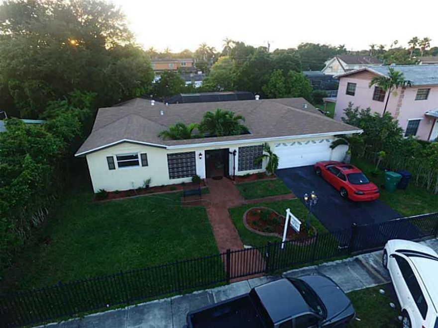 Price reduced,Seller is motivated. PRICED TO SELL!.Beautiful home with a pool in an oversized lot.Property has an open kitchen design with granite counter-top and Bosch Appliances. Roof recently made in 2011 and pool resurfaced(2012).Stunning front facade  with detailed landscaping; property is fenced and has a spacious 2 car garage.Hurricane shutters included     Roof- installed on Dec 2011 with 10 yr warranty   Pool- resurfaced July 2012 with 5 yr warranty. MUST WATCH: https://youtu.be/ZpOHLcYu3bI