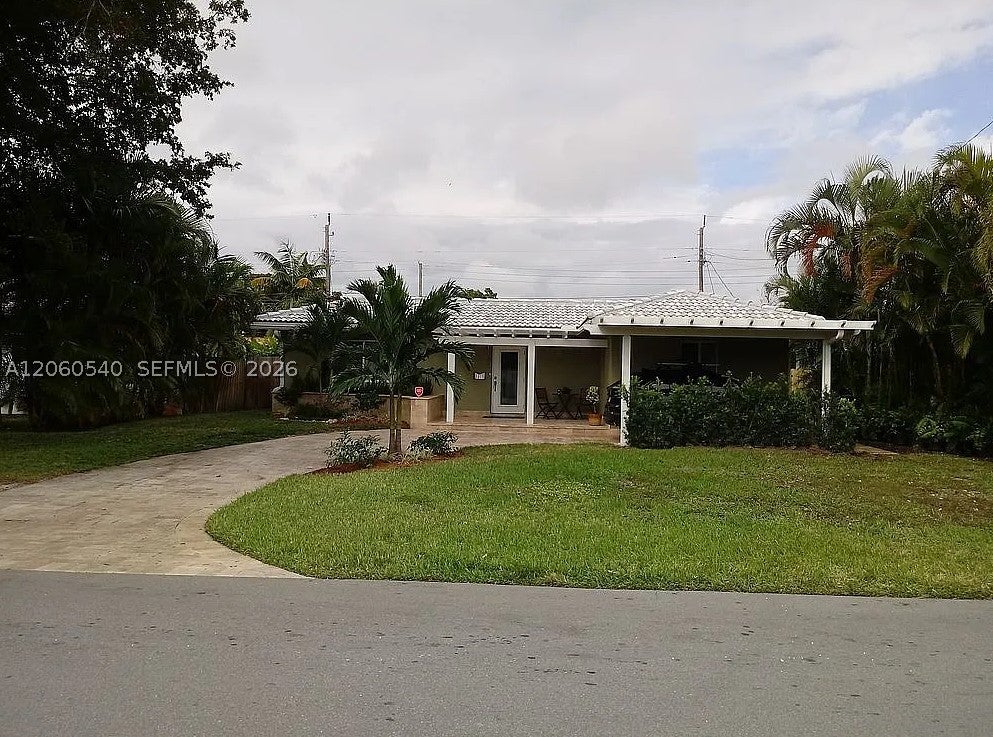 Photo of 709 NE 16th St, Fort Lauderdale, FL 33304 (MLS # A12060540)
