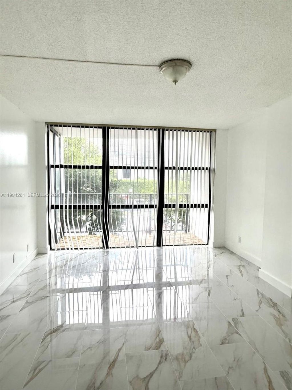 Photo of 800 Parkview Dr #217, Hallandale Beach, FL 33009 (MLS # A11994281)