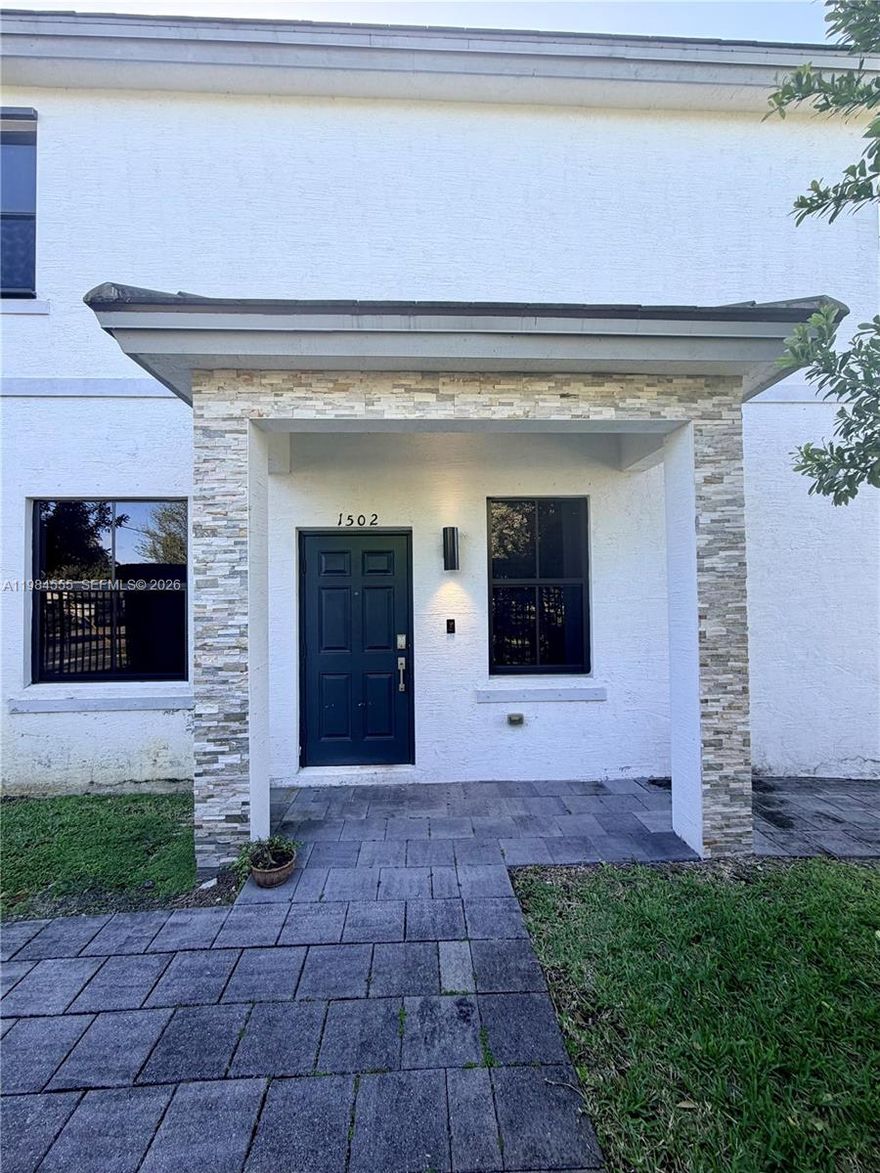 Open concept 3 bedroom 2.5 bath townhome in a gated community in Ft. Lauderdale. Quick access to I-95, 595, Turnpike, FLL Airport, beaches, and Las Olas Blvd with many restaurants and entertainment. This corner unit has a large side yard and a fenced in back patio. First floor entry with tile flooring, modern kitchen with stainless appliances and an open layout. Second story has upgraded vinyl flooring. Bright and spacious master bedroom with walk-in closets. One car garage with additional parking in carport/driveway. The community includes a large pet-friendly grass field and a swimming pool with cabana area.