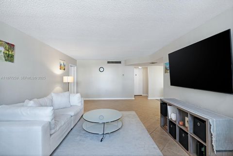 Photo of 100 Golden Isles Dr #101, Hallandale Beach, FL 33009 (MLS # A11877259)