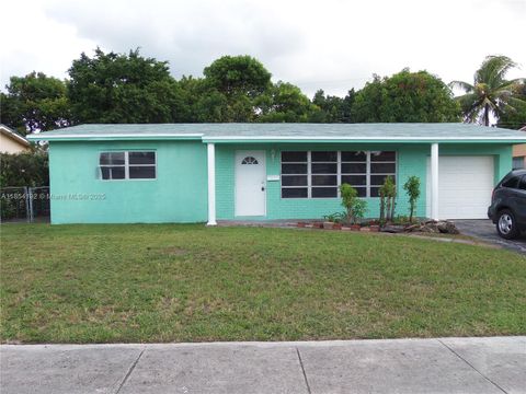 Photo of 5960 NW 16th Ct, Sunrise, FL 33313 (MLS # A11854192)