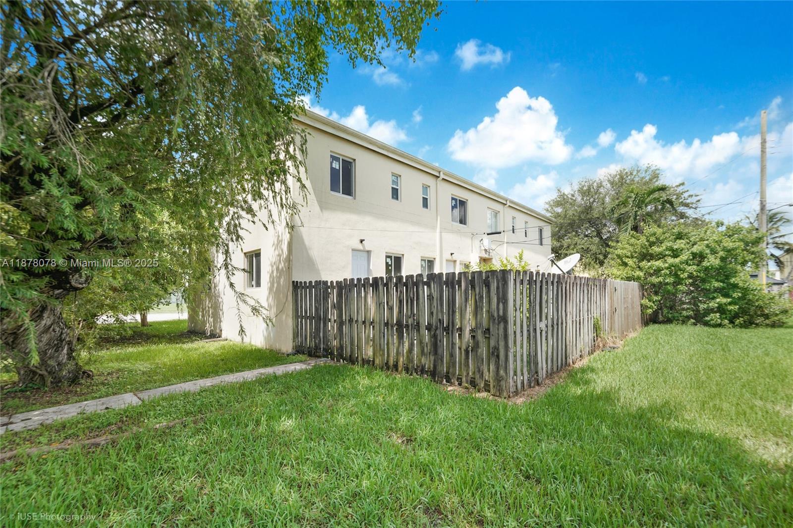 IMPACT WINDOWS - CORNER UNIT - FENCED BACKYARD. Welcome to 8301 NW 5th Ave, this cozy townhome is ready for a new owner! This unit is very unique as it is the corner unit of the building and entire community, making parking and access easier. As you walk in, you are greeted with the living and dining area. The kitchen has a small pantry. All 4 bedrooms and 2 bathrooms are upstairs, each spacious with generous closet space. There is lot's of storage space in this home: Multiple hallway closets upstairs and a good sized laundry area under the stairs downstairs. The windows are hurricane-impact rated. The backyard is cozy and fenced, with a side gate leading to a grassy area neighboring NW 83rd. Overall, this spacious home is a great starter home or rental property. Schedule a showing today!