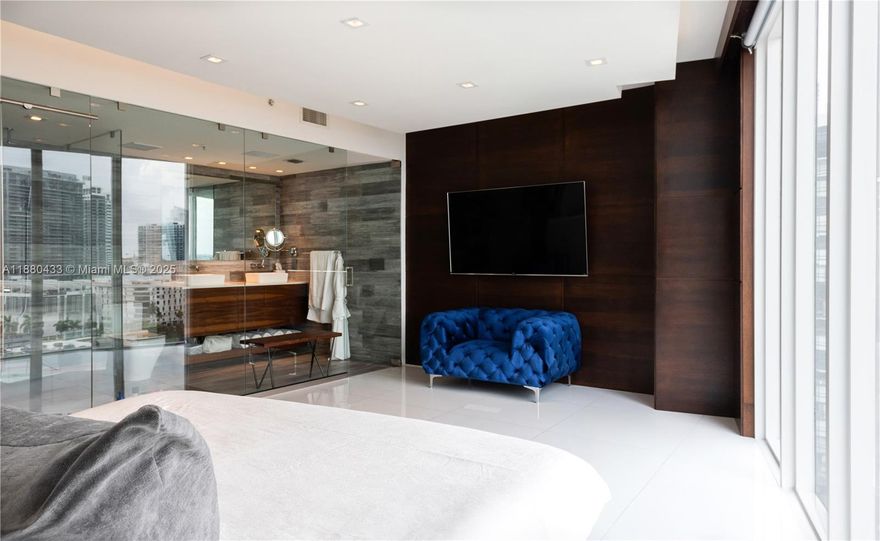 NEW ON THE MARKET! Welcome to the Blue Condo in Edgewater, Miami. This renovated unit offers 1,449 square feet of luxurious living space, located just 5 minutes from the Miami Art District. This upgraded unit features floor-to-ceiling windows that provide abundant natural light. The 2-bedroom, 2.5-bath residence boasts a fully revamped kitchen with stainless steel European appliances and porcelain floors. Both bedrooms have custom built-in closets and en-suite bathrooms, with the master bedroom also featuring floor-to-ceiling windows. Additional upgrades include new flooring and electric blinds. Community amenities include twin pools, a jacuzzi, a fully equipped gym with a sauna, valet service, a premier in-house movie theater, a playroom, a mini market, and 24-hour concierge services.