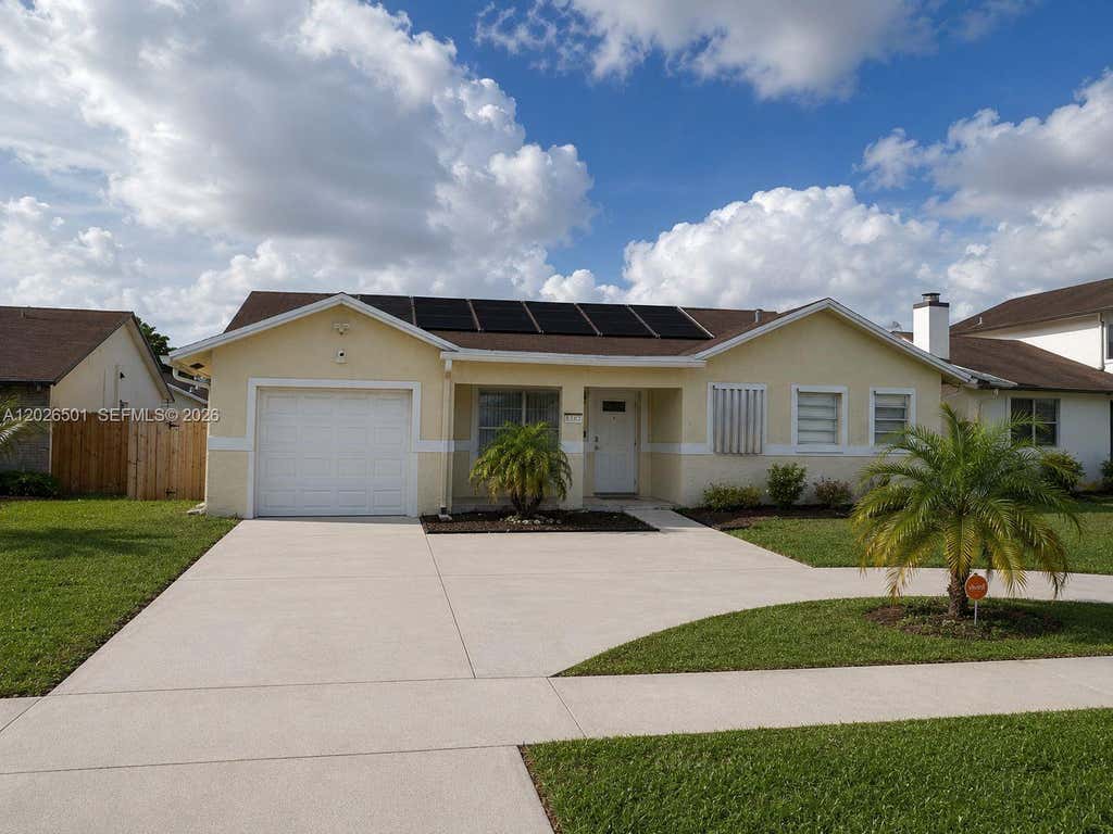Photo of 8303 SW 20th St, North Lauderdale, FL 33068 (MLS # A12026501)