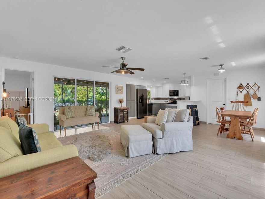 Welcome to this beautifully maintained 2-bedroom, 2-bath home offering comfort, charm, and thoughtful updates throughout. A welcoming front porch creates inviting curb appeal and the perfect place to enjoy peaceful mornings with your coffee. Inside, the home features fresh interior paint, custom wood trim wall accents, and a stylish custom wood barn door in the primary bathroom that adds warmth and character. The bright and spacious layout offers a comfortable flow with abundant natural light. Sliding glass doors lead to a screened lanai, creating an ideal indoor-outdoor living space perfect for relaxing evenings or outdoor dining. Major upgrades include a metal roof (2023), upgraded underground cable/internet line (2024), and a new hot water heater (2025). Newer Shed. Hurricane shutters and a wireless SimpliSafe security system provide added peace of mind. The property has had no flooding and no structural damage. Meticulously cared for and move-in ready, this home offers a wonderful opportunity to enjoy the Southwest Florida lifestyle.