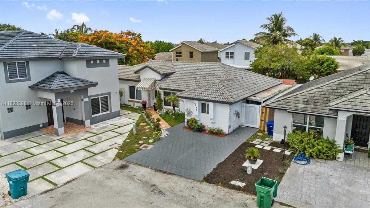 Beautiful 4 bedroom and 2 bath plus income. Private and gated community right off of Red Road. This is the perfect location close to restaurants, supermarkets and highways. Property has been recently renovated with new floors, kitchen and bathrooms. Produces income and a must-see. Call L/A for more info