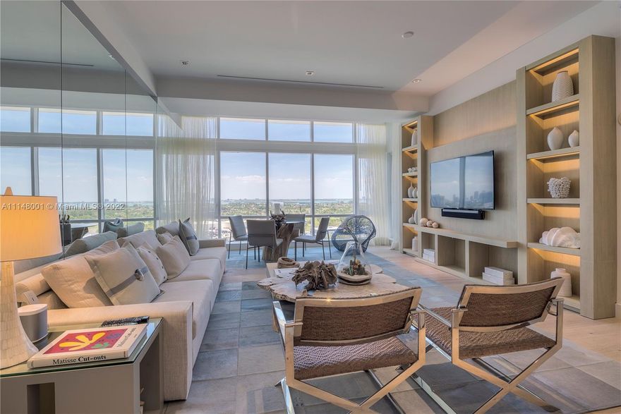 Welcome to an awe-inspiring entrance with soaring floor-to-ceiling windows offering stunning views of the Miami skyline. This highly sought-after 2-bed penthouse at 1 Hotel & Homes boasts stunning upgrades, including a custom furniture package by Artefacto. The bedrooms offer ample closet space while the private balcony and chef's kitchen with top-of-the-line appliances make for a perfect retreat. The entire residence has oak wood floors throughout. The master bedroom is a serene sanctuary with a resort-like ensuite master bathroom. Enjoy personal concierge services and full-time staff in the private residence lobby along with four pools, four restaurants, three bars, a 14,000 sqft gym, Bamford spa, hair salon, Soul Cycle, children's area, valet attendants, and chauffeured house cars.