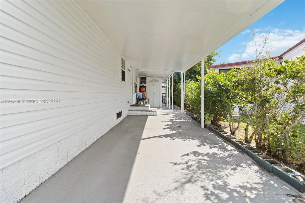 Photo of 5720 SW Cypress Dr, Dania Beach, FL 33312 (MLS # A11952964)