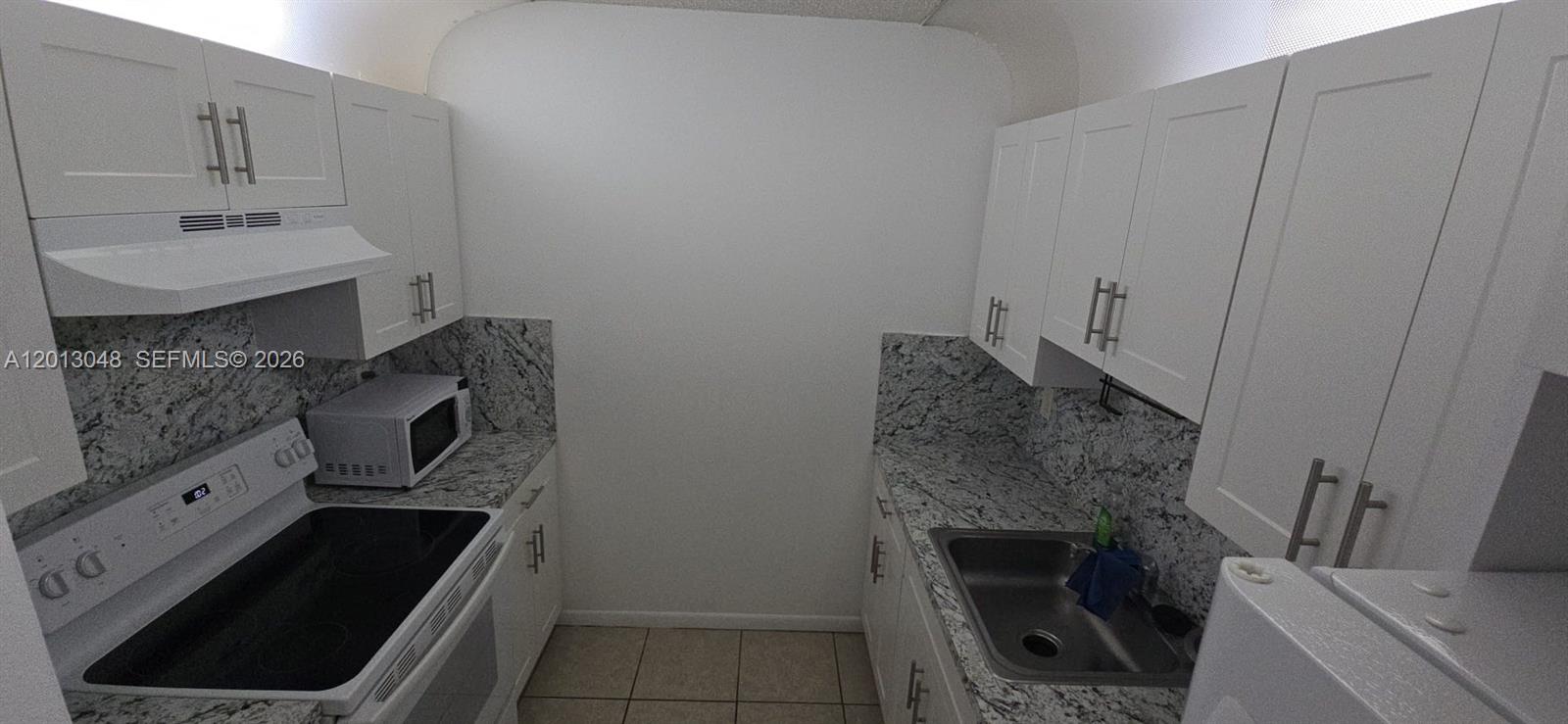 SAGA BAY GARDENS CONDO - Residential