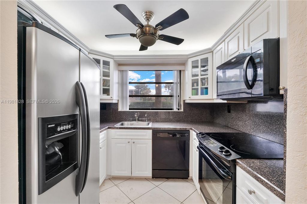 Photo of 1101 Colony Point Cir #101, Pembroke Pines, FL 33026 (MLS # A11981828)