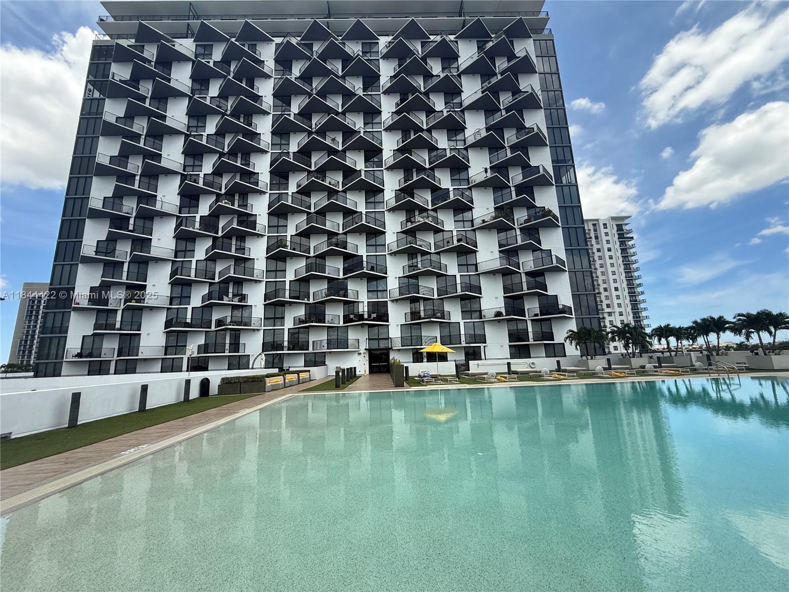 Live in the Heart of Downtown Doral! Spacious and modern 2-bedroom, 2-bathroom unit featuring a large principal bedroom with a walk-in closet, sleek tile flooring throughout, and an open kitchen with stainless steel appliances and stone countertops. Enjoy abundant natural light and beautiful views through expansive windows. Rent includes water, internet, and cable. The building offers 24-hour concierge service, valet parking, and top-notch amenities. Prime location—steps from highly rated charter schools, restaurants, shops, and more. Minutes to Miami International Airport, FIU, Miami Dade College, and Dolphin Mall. A must-see!