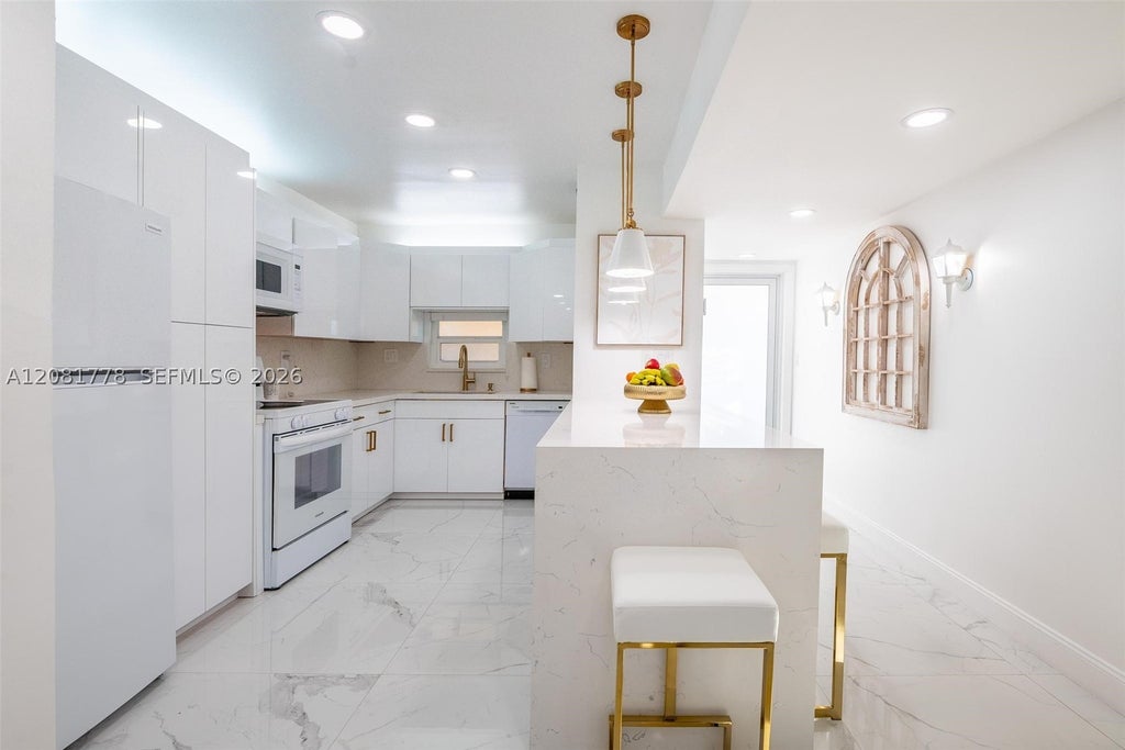 Photo of 300 S Hollybrook Dr #310, Pembroke Pines, FL 33025 (MLS # A12081778)