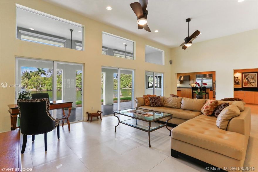 Welcome to this gorgeous renovated lakefront home in Highland Lakes. Situated on a quiet tree lined street, you enter your property to an extended, circular, Old Chicago brick driveway. This home is four-bedroom, two-and one-half-bath and is clean and ready to move in. The one-level house has Italian limestone tile and is all open to a top-of-the line, custom kitchen including Wolf and Sub-Zero appliances. A huge great room with 12-foot ceiling centers the mesmerizing views of the lake and sunsets. There is plenty of room for entertaining. Impact windows and doors, a house generator and plenty of storage help make this a dream home. Tucked away in a guard-gated community, this residence is within easy access to dining, shopping, houses of worship and Interstate 95.