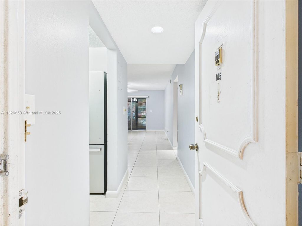 Photo of 4113 NW 88th Ave #105, Coral Springs, FL 33065 (MLS # A11826660)