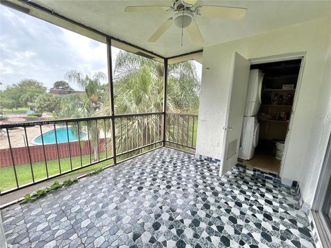 Photo of 7480 NW 17th St #305, Plantation, FL 33313 (MLS # A11838449)