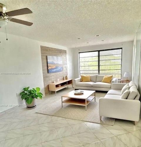 Photo of 7480 NW 17th St #305, Plantation, FL 33313 (MLS # A11838449)