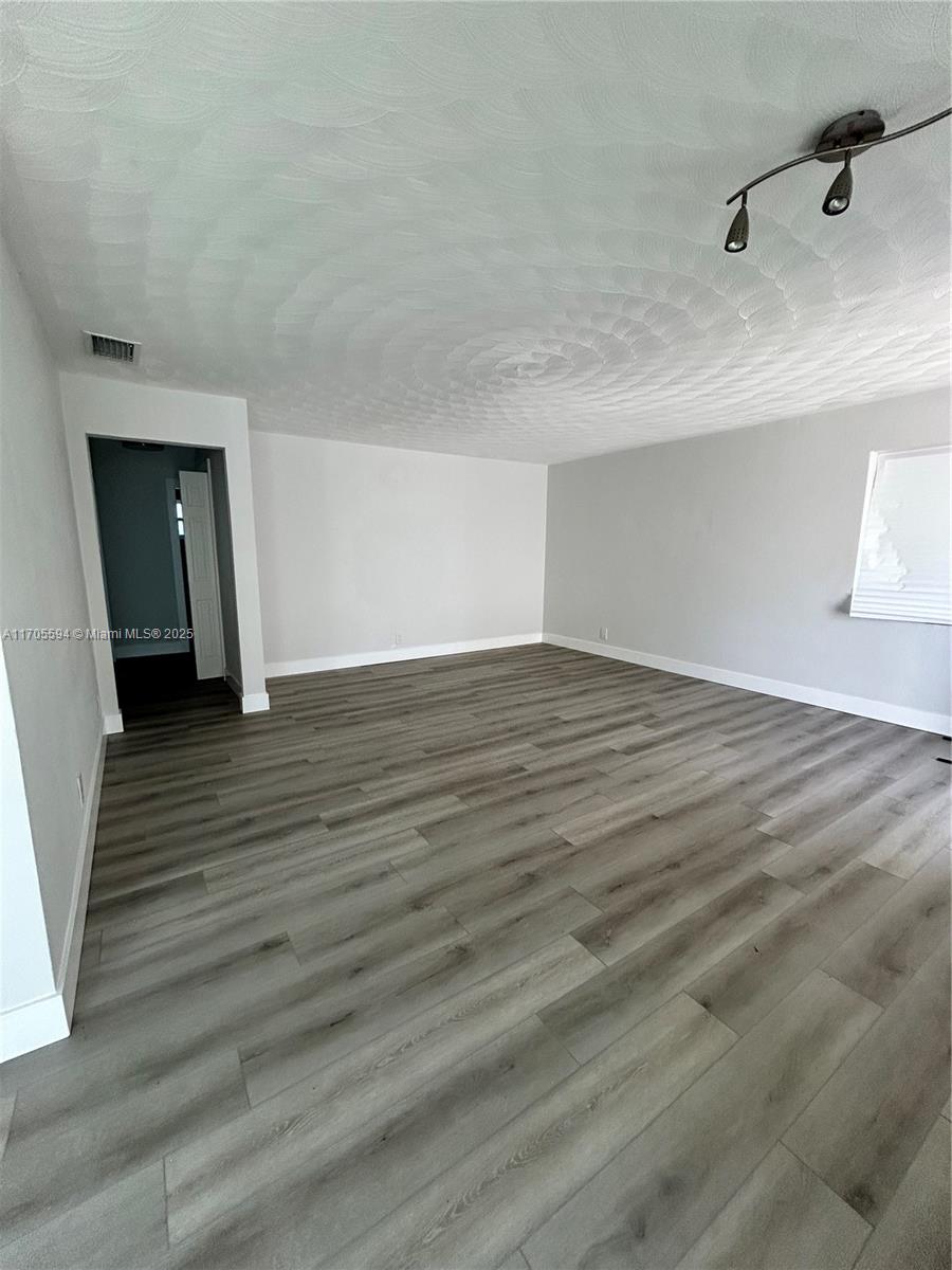 RENOVATED 3 Bedroom Unit . Tenant pays all utilities except Water. Shared laundry