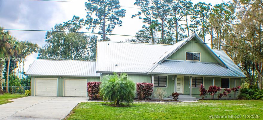 LOCATED IN ONE OF LABELLE’S NICEST NEIGHBORHOODS! Home is concrete block with T1-11 wood siding and renovated including a new galvalume roof, new kitchen, bathrooms, and flooring, etc. Floor plan downstairs features a huge living area including formal living, formal dining, and family room, two bedrooms with guest bath in between, a spacious kitchen, and casual dining room with bar or game room for entertaining. There is an open front porch entry plus a large wood deck runs the length of the rear of home, a spacious two vehicle garage and your own tree house for the kids or grandkids to enjoy! The upstairs features the master bedroom and bath plus extra rooms for utility or closet--or exercise and office--plus your own balcony! Home site is almost 1/2 acre and boast lovely trees.