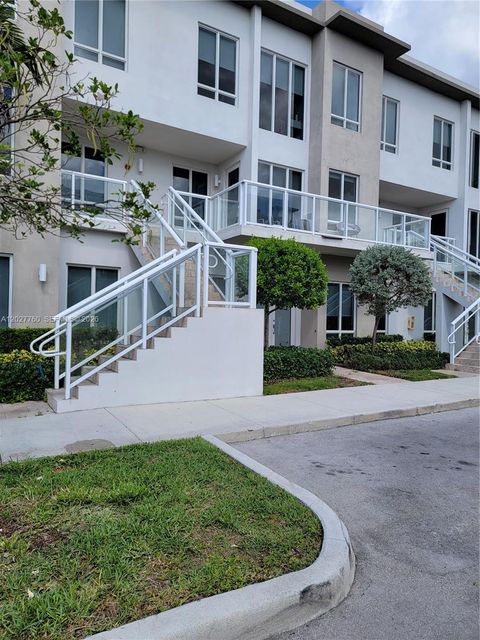 Photo of 6310 NW 103rd Pl #202, Doral, FL 33178 (MLS # A12027760)