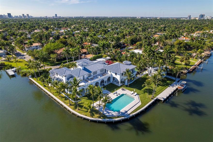 Step inside this stunning waterfront estate sitting on over 1 acre, triple corner lot with 450" of redone seawall. The home was remodeled in 2020 with no expense spared, including a new boat lift that can accommodate up to 80ft boat, 1 folding dock for 3 jet skies and tender, 2 wine cellars, theatre room, tennis court, fitness room, custom doors + archways, and so much more. Enjoy spectacular water and Intracoastal views from every room in the house. The separate guest house boasts 2 beds and 2 baths. Great location minutes from Aventura mall, FTL airport, and major highways.