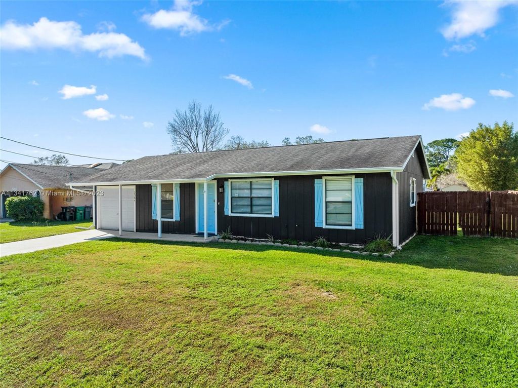 Photo of 2384 SW Caballero St, Port Saint Lucie, FL 34953 (MLS # A11341762)