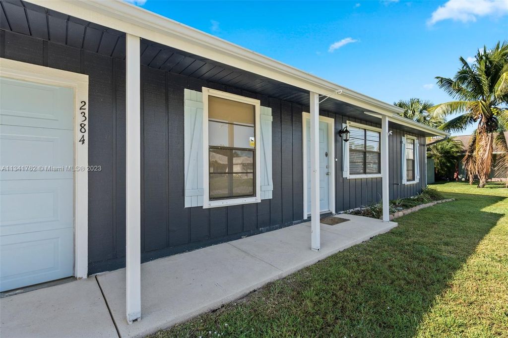 Photo of 2384 SW Caballero St, Port Saint Lucie, FL 34953 (MLS # A11341762)