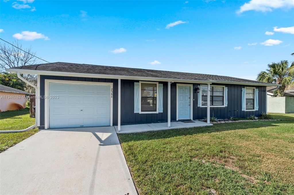 Photo of 2384 SW Caballero St, Port Saint Lucie, FL 34953 (MLS # A11341762)