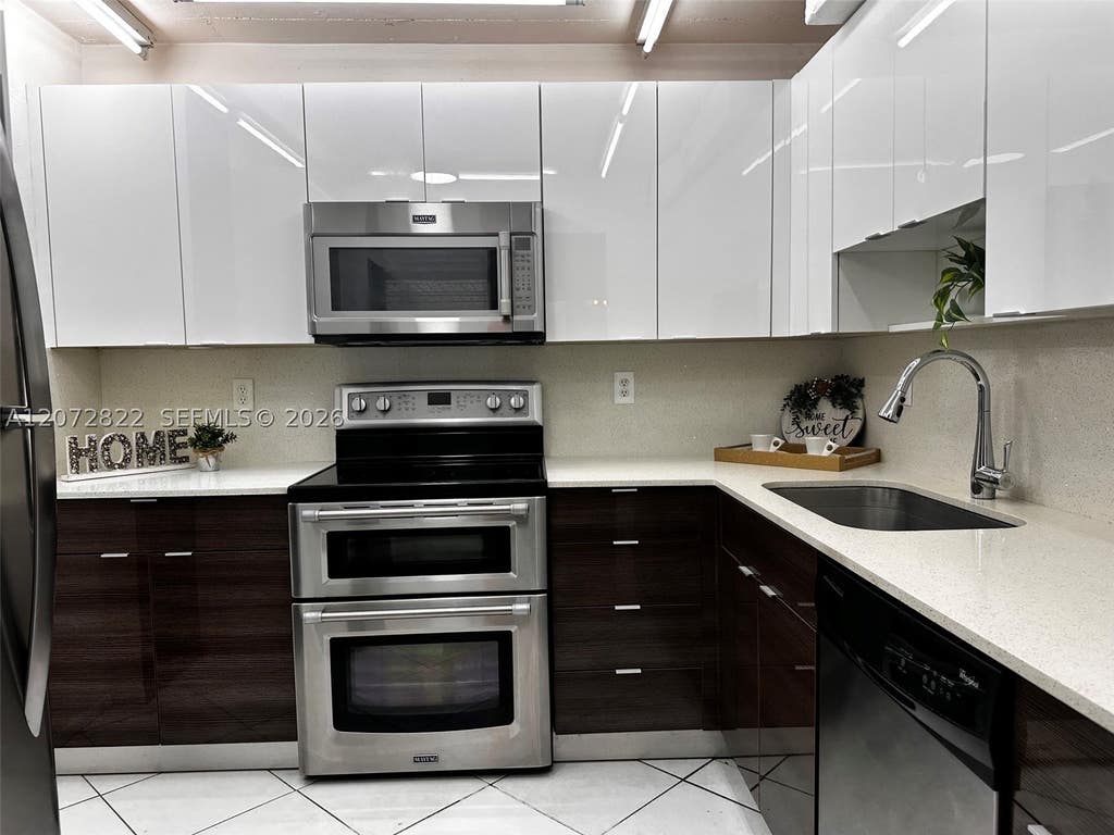 Photo of 6700 Cypress Rd #111, Plantation, FL 33317 (MLS # A12072822)