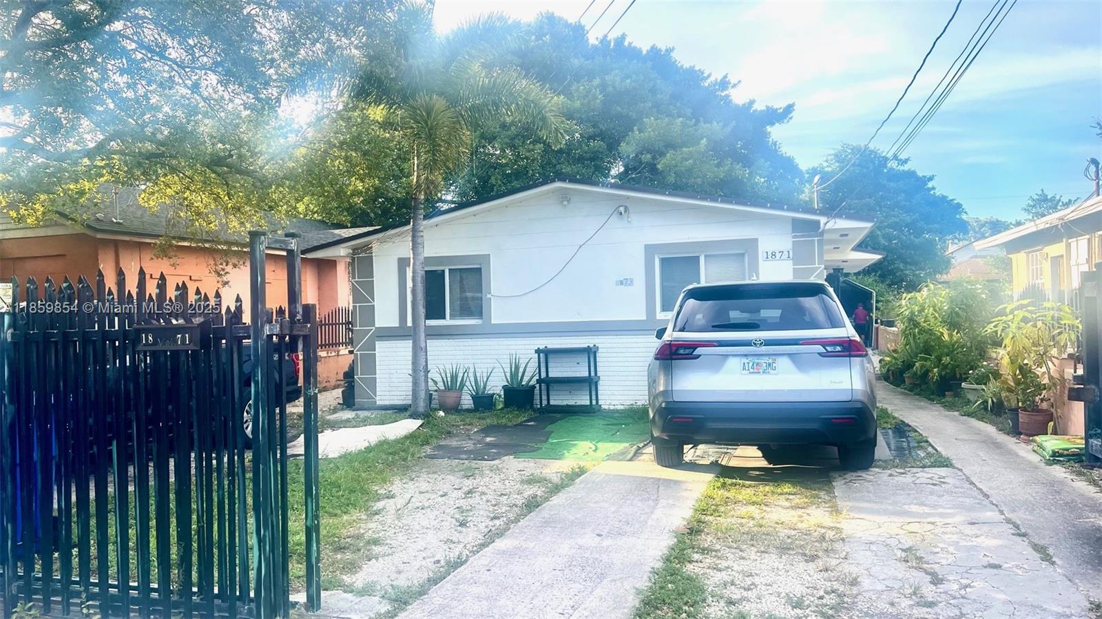 Part of a duplex, this fully tiled home is located just two blocks from the Metrorail and only minutes from MIA Airport. Conveniently close to SR-112 and I-95 (just four blocks away). Features include 2 bedrooms, 1 bath, a large patio.
