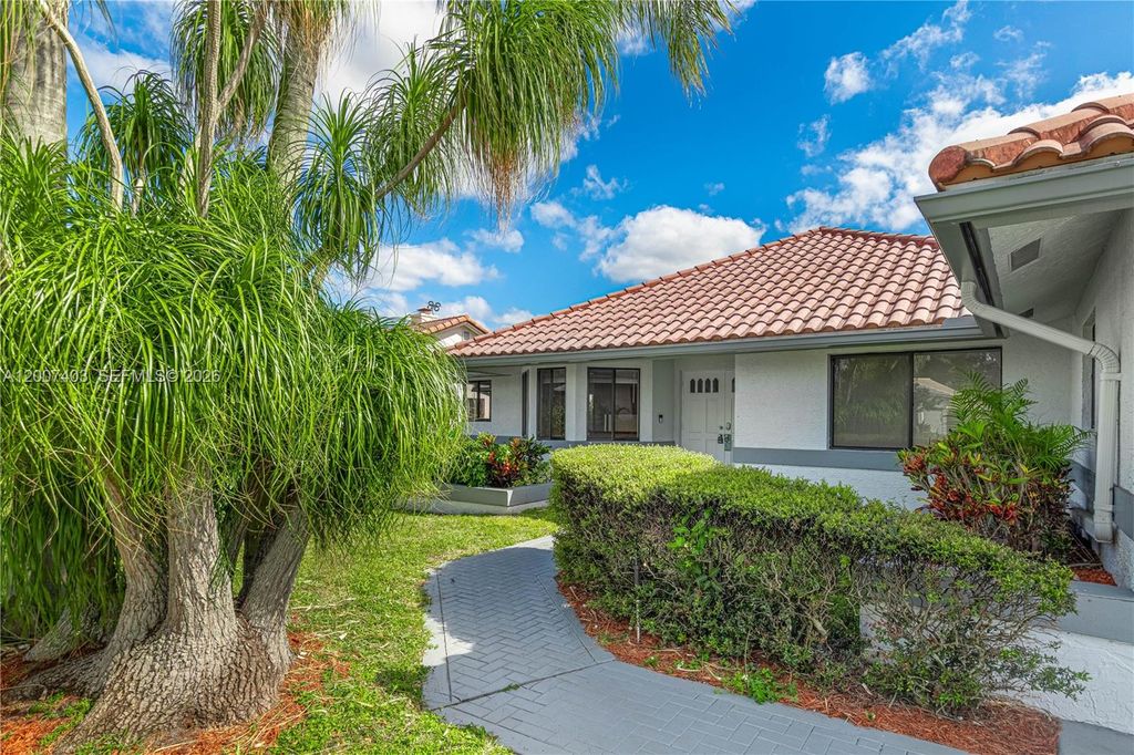 Photo of 8612 NW 79th St, Tamarac, FL 33321 (MLS # A12007403)