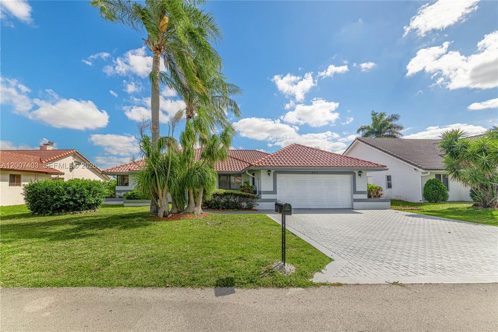 Photo of 8612 NW 79th St, Tamarac, FL 33321 (MLS # A12007403)