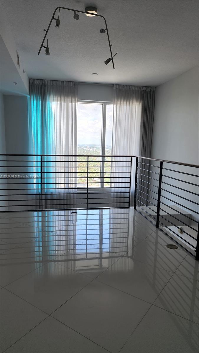 INFINITY AT BRICKELL COND - Residential Lease