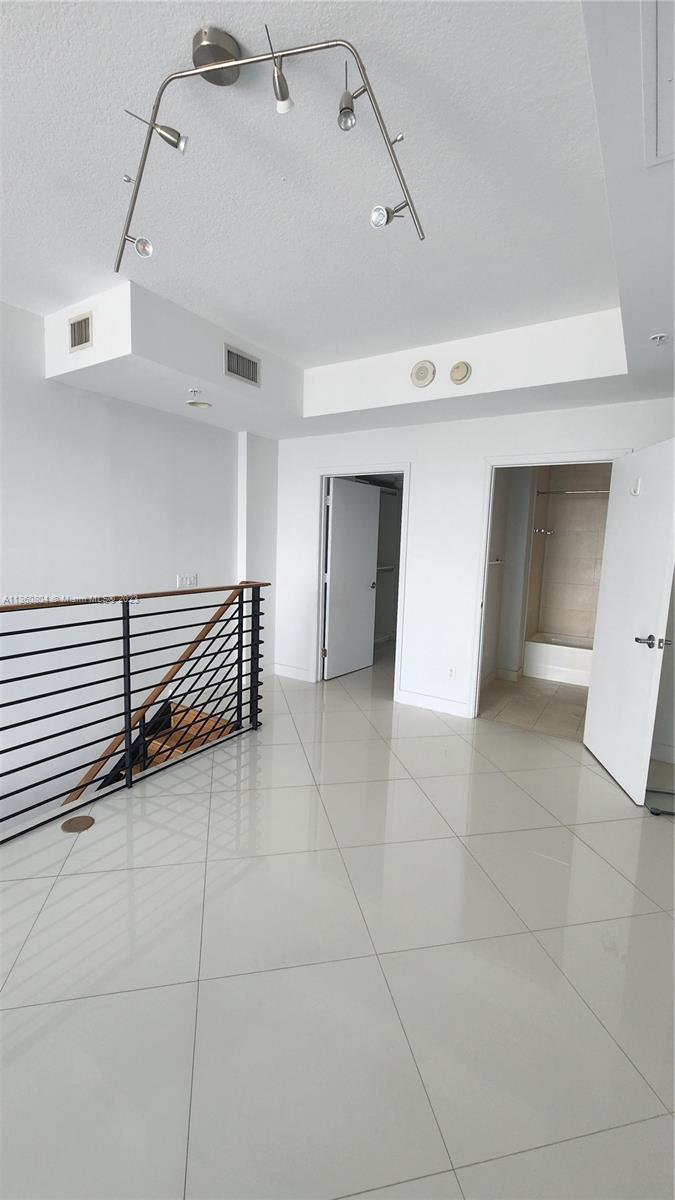 INFINITY AT BRICKELL COND - Residential Lease