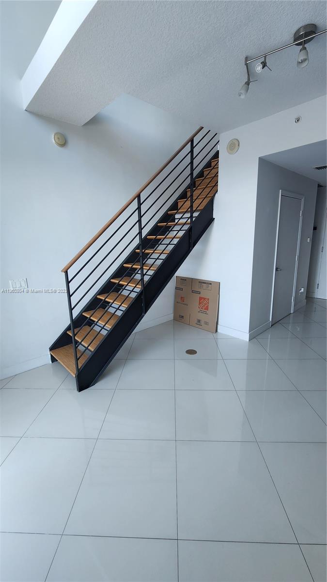 INFINITY AT BRICKELL COND - Residential Lease