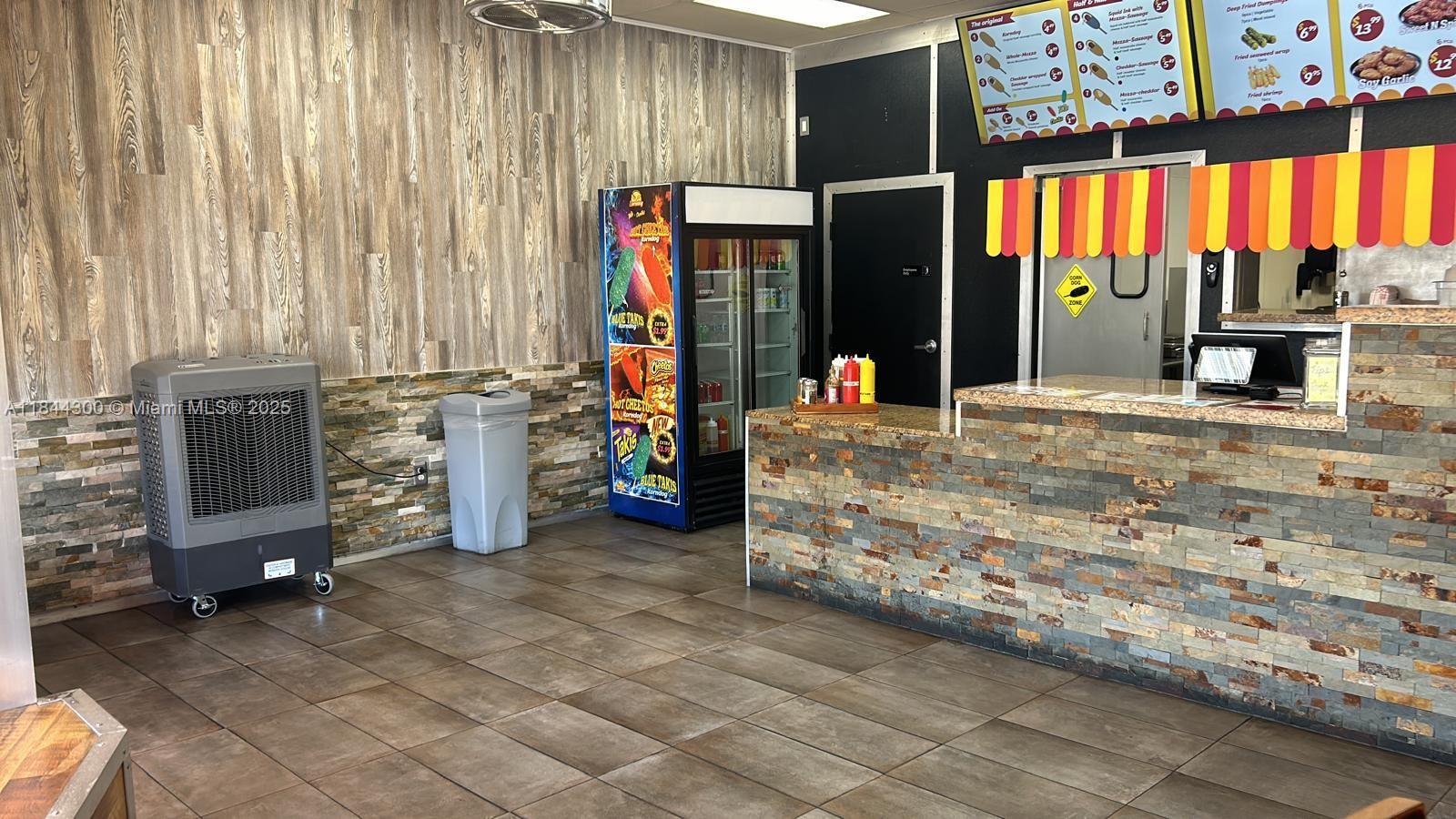 Turnkey business opportunity! Established and fully operational Korean-style corndog restaurant located in a busy commercial plaza on NW 7th Ave. High-traffic location with excellent visibility. Sale includes equipment, furnishings, and licenses. Affordable lease in place with options to renew. Business has a loyal customer base, strong online presence, and great growth potential. Perfect for owner-operators or investors. Real estate not included.
