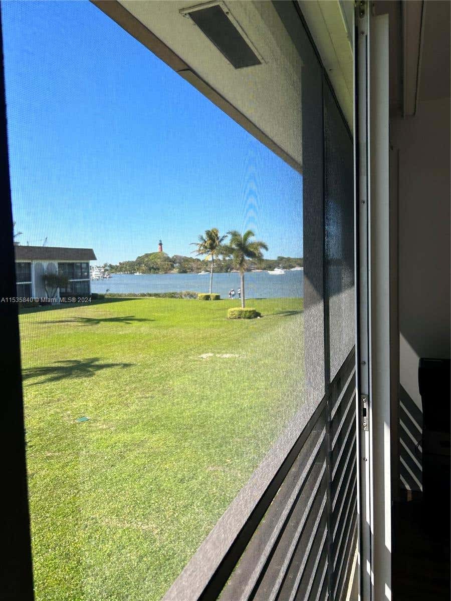 Photo of 755 S Saturn St #E201, Jupiter, FL 33477 (MLS # A11535840)