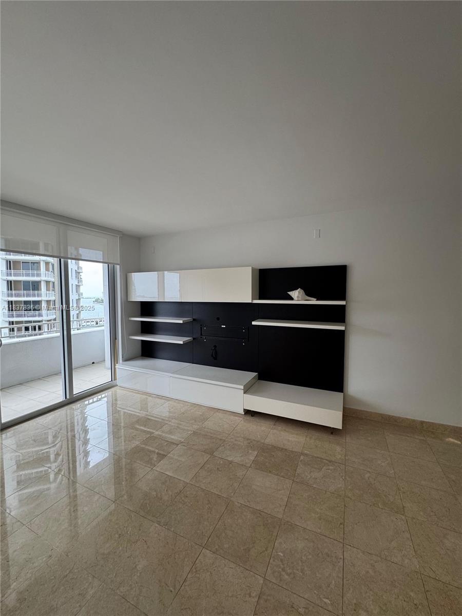 Spacious 1bedroom, 1 full and 1 half bath unit on Brickell Key! Marble floors in the kitchen that opens to the living room and warm wood floors in the bedroom, lots of closets, washer and dryer in unit. Enjoy updated stainless steel appliances in the kitchen and a nice size balcony overlooking the Miami Skyline and the Miami River leading to the Bay. This unit comes with one parking space and is a full-service building with 24 hr. doorman, package service, valet, gym, pool, racquetball court, theater, business, party and children’s playrooms. Brickell is a walkable island with shops, salons, small grocery store, salon and dog park. There is a beautiful waterfront walking trail around the perimeter of the island that over looks the Miami Skyline and Biscayne Bay.