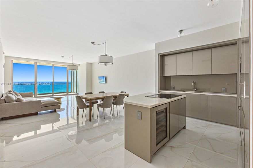 Experience luxury living at Residences by Armani Casa in Sunny Isles Beach. This stunning 4-bedroom + den, 4.5-bath residence features an elegant Italian-designed kitchen with top-of-the-line appliances, a private foyer with dual elevators, and a full-size laundry room with sink. Enjoy breathtaking sunrise and sunset views from dual balconies, complete with an outdoor summer kitchen.

The residence offers refined details, open living spaces, and an ideal layout for both relaxation and entertaining. Armani Casa is a world-class, 5-star oceanfront development with unmatched amenities including full beach and pool service, state-of-the-art fitness center, spa and sauna, restaurant, lounge, and much more. A perfect combination of sophistication, comfort, and resort-style living.