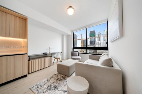 225 N Miami 1207 Miami FL 33128