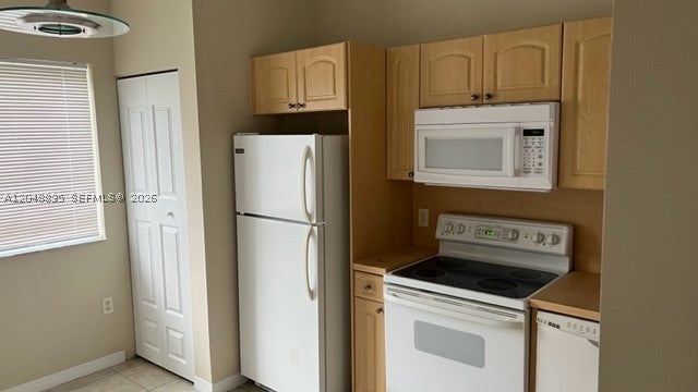 Photo of 7940 NW 6th St #202, Pembroke Pines, FL 33024 (MLS # A12048895)
