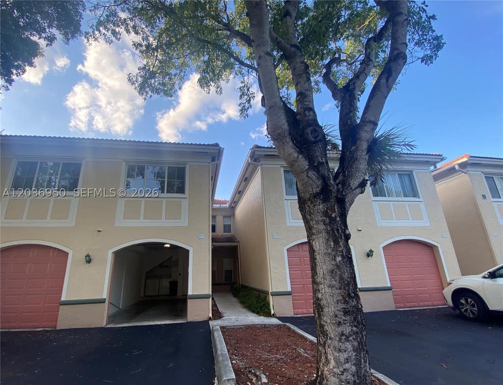 Photo of 2492 Centergate Dr #102, Miramar, FL 33025 (MLS # A12036950)